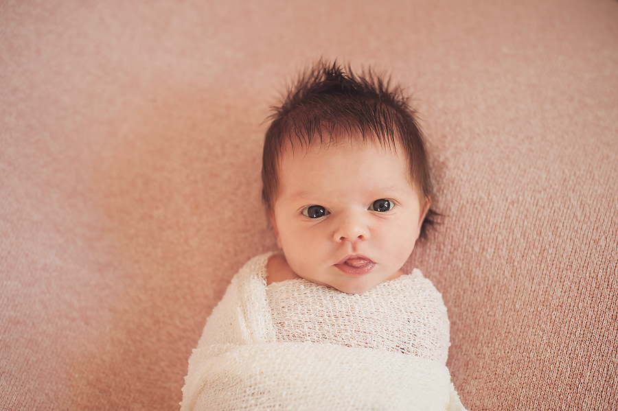 newborn baby looking awake