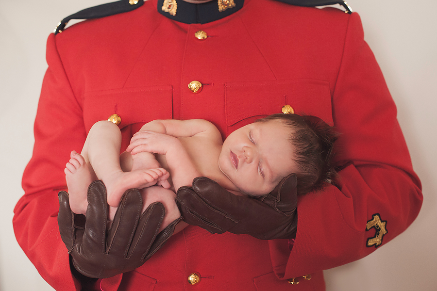 RCMP holding new baby 