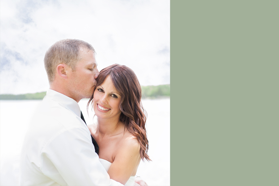 beautiful couple embracing on their wedding day at Lake Utopia