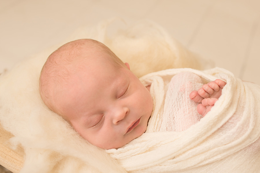 Saint John Photographer - Newborn baby sleeping and wrapped in a  cream wrap