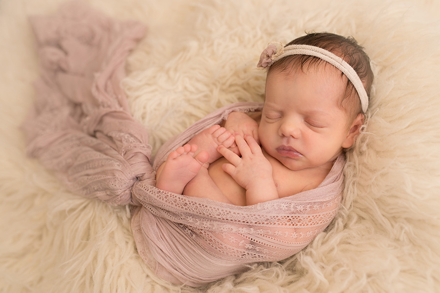 Saint John Photographer - baby girl wrapped in pink scarf sleeping