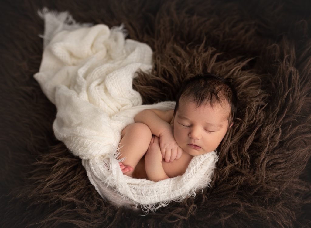 how much does a newborn shoot like this cost?
